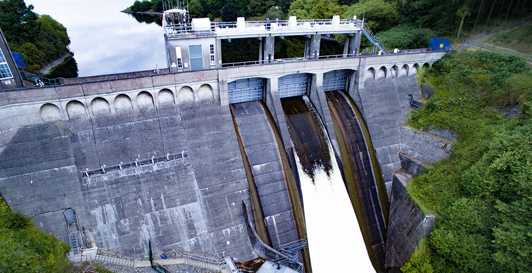 Photograph of a working dam taken from above