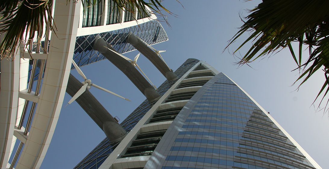 Photograph of some tall skyscrapers taken from the ground looking up